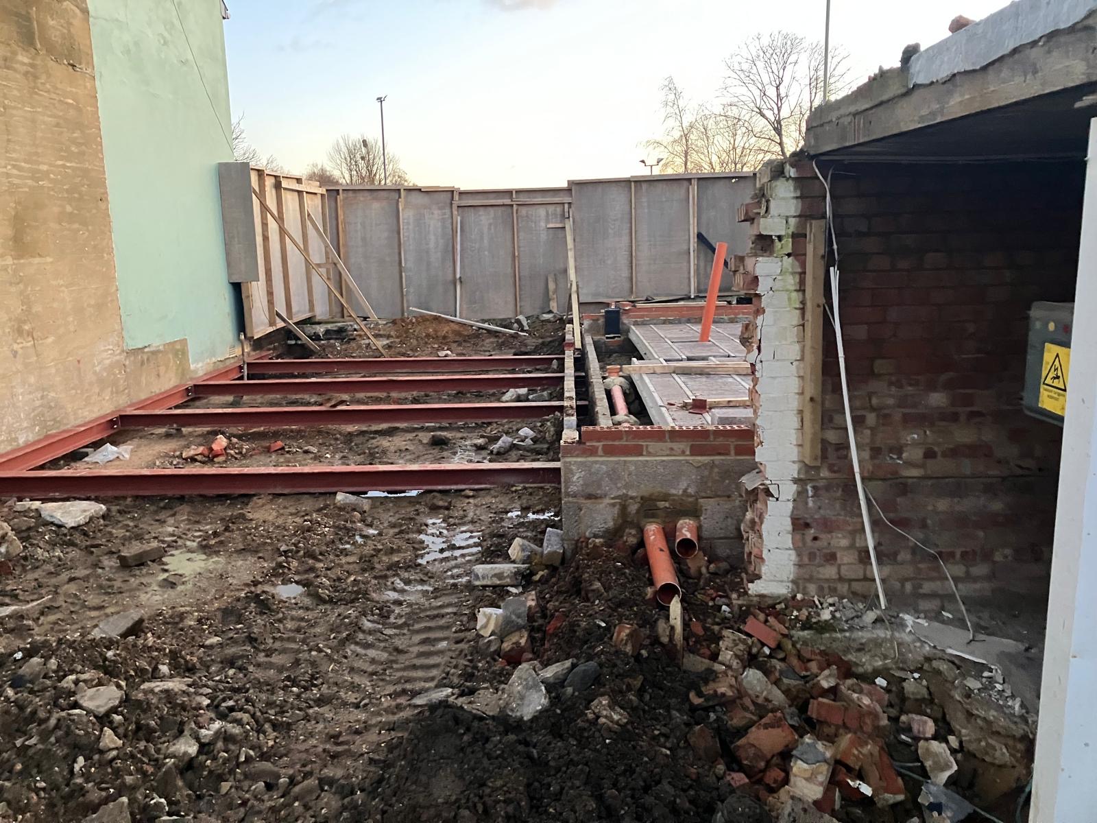 Apartment block ground steelwork and drainage set out